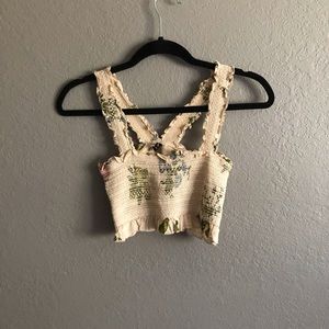 OUT FROM UNDER CROP TOP. BRAND NEW. NEVER WORN